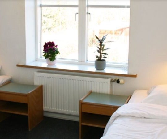 4-bed family room, with shared bathroom incl. bed linen & towel set